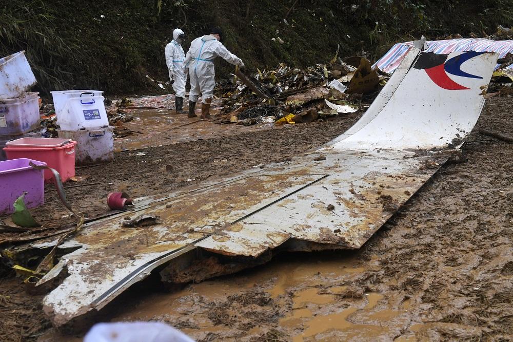 東航空難發生將近一個月,民航局指事故原因仍在調查中,還未能下結論。(新華社)