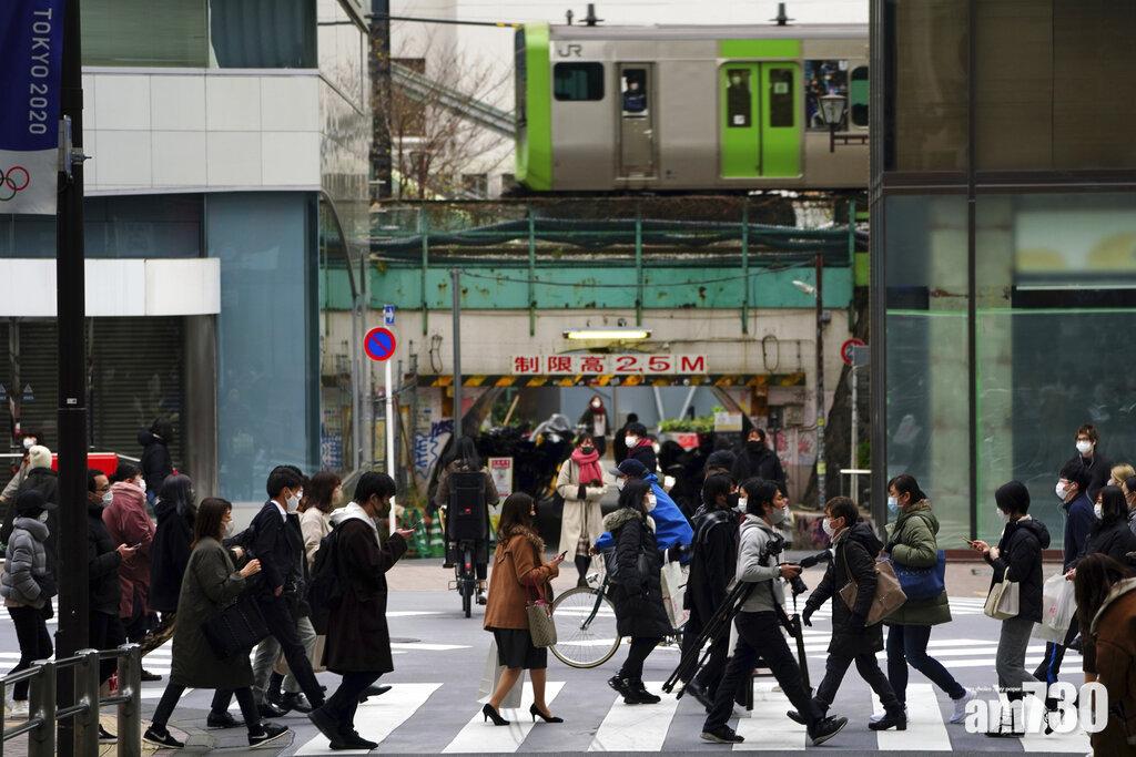 政府本周內將對東京等首都圈地區頒布緊急狀態。圖為東京涉谷街頭。(美聯社)