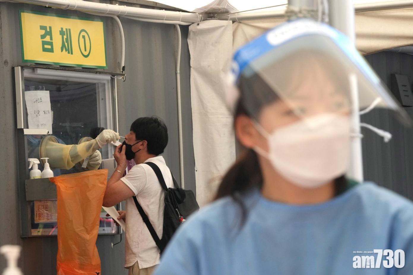 首爾設置流動檢測站,為民眾採樣。(美聯社)